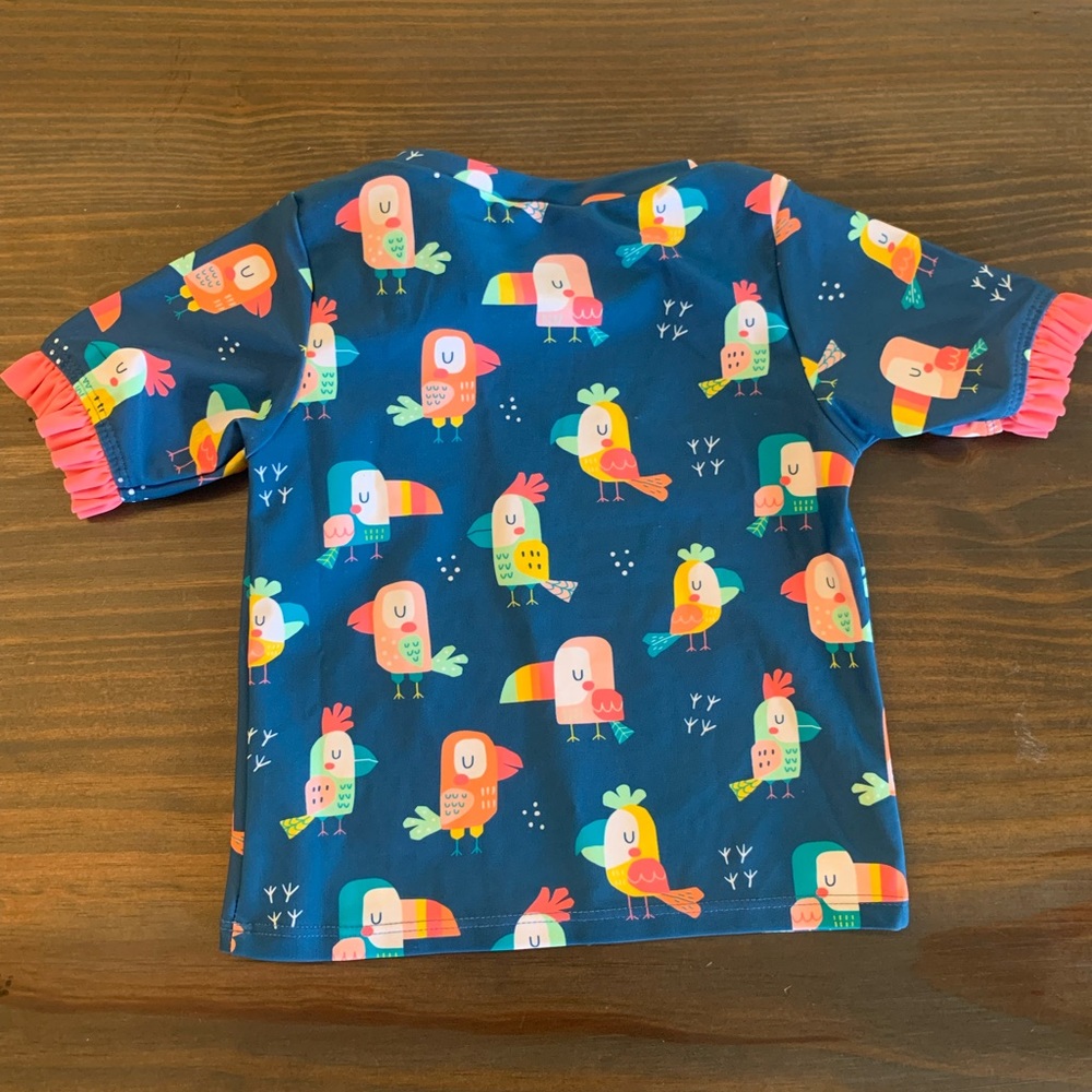 NWT Ruffle Butts Mid-Sleeve Rash Guard. You’re the Tweetest pattern. 2T. - Picture 2 of 3